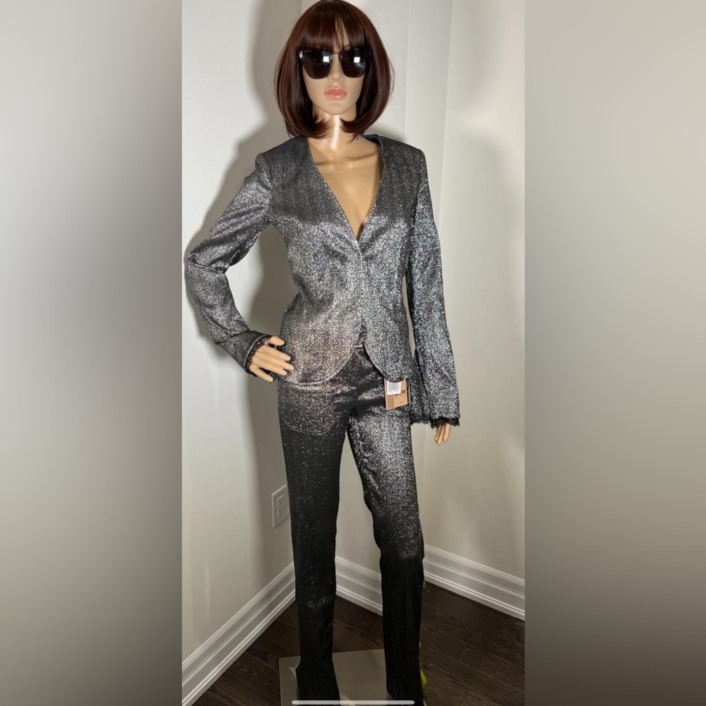 Brand  Babylon, new with tags, two pieces suit.